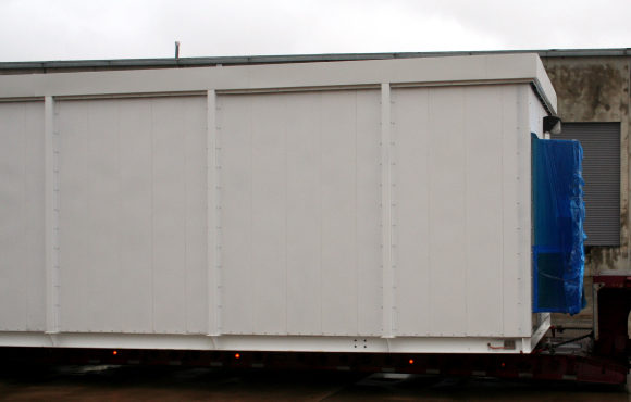 power building with rear drop out access panels